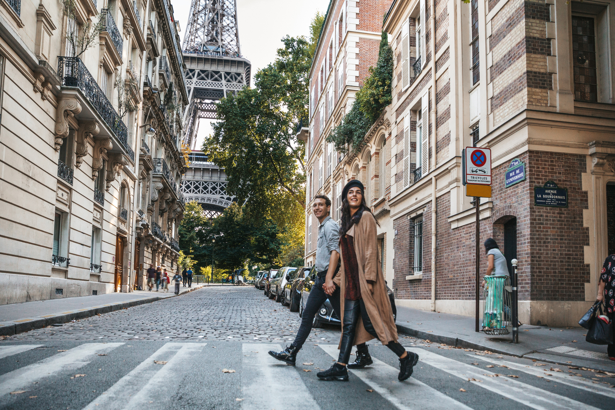 couple strolling near our romantic hotel in paris